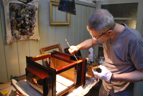 Restaurierung Flötenuhr